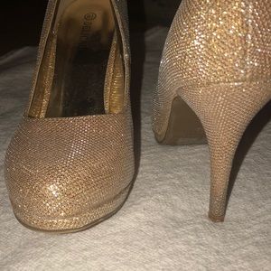 Delicacy Brand Gold Pumps.
